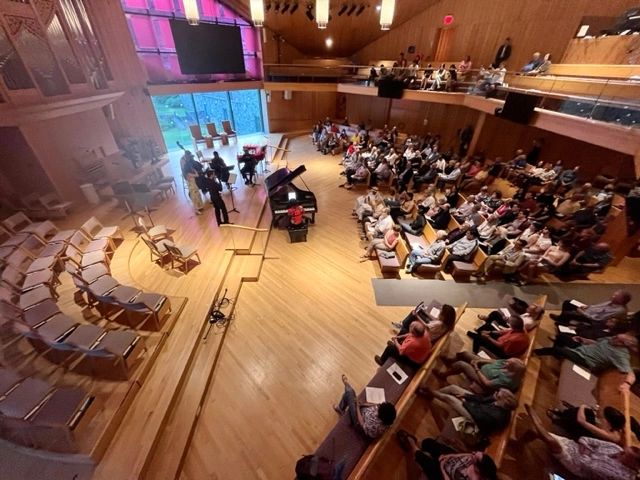A musical performance in the sanctuary at the UU Congregation at Shelter Rock in Manhasset