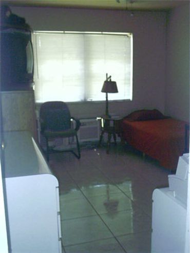 Small room tiled floor window.