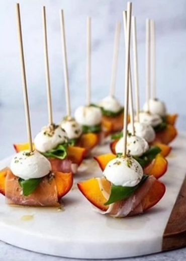 Prosciutto and mozzarella skewers.