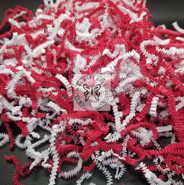 Red and white crinkle stuffing. The perfect way to pop your Valentines gift boxes.