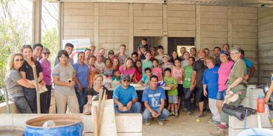 Volunteer group from the US with completed home