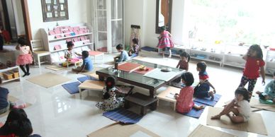 A busy Primary Montessori Environment. Practical Life. Sensorial. Culture. Math. Language. 