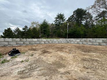 Building a block retaining wall system in Richmond, RI.