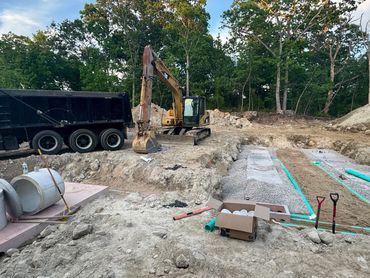 Full view of installing a flow diffuser septic system in East Greenwich, RI.