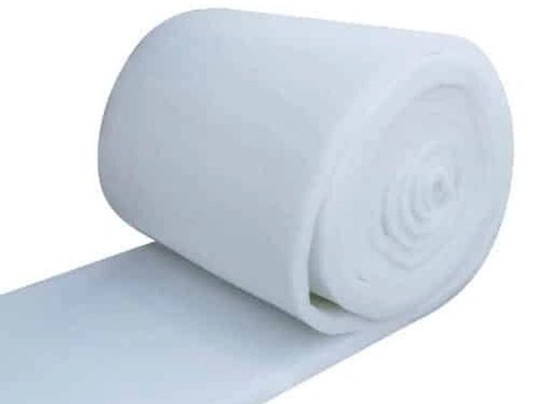 Rolled white foam padding sheet for cushioning or insulation.
