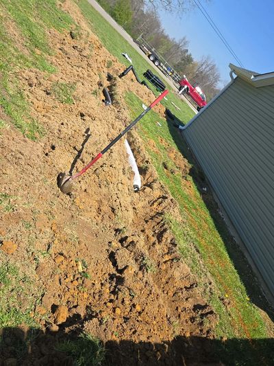 French drain installation and residential backyard drainage work in Catoosa County GA by Mowjo Lawns