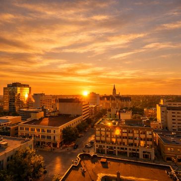 City skyline at sunset with golden light.
