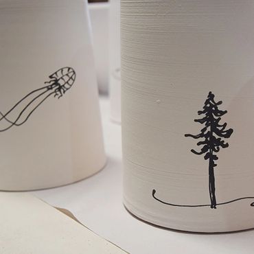 Pottery with tree drawing