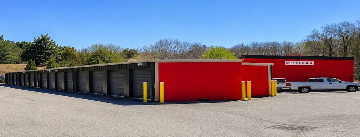 Red and grey storage building.