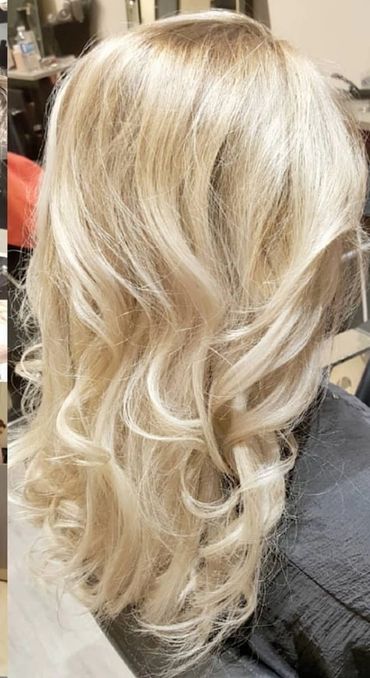 Radiant blonde highlights & soft layers transformation by Adriana Balea at Studio B Toronto.