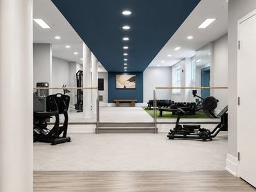 Windsor Leesburg fitness center with a full equipment set and ADA-compliant step-down transition