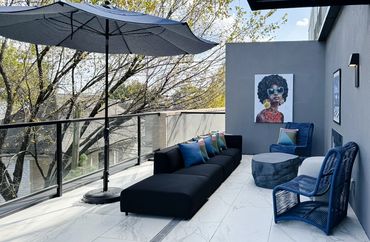 Outdoor Multifamily clubroom with Design by Design by DuBois