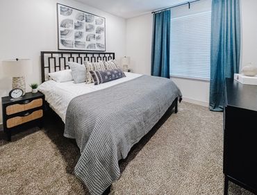 Model apartment multifamily bedroom interior design by Design by DuBois