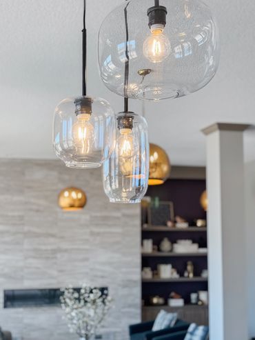 Multifamily clubroom with fireplace, curved seating, and layered textures – Altitude 970 Kansas City