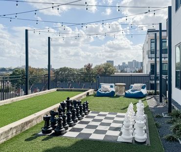 Outdoor Multifamily clubroom with Design by Design by DuBois