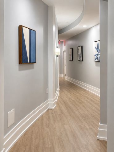 Leesburg Virginia Renovation Multifamily project corridor lighting and layout with artwork