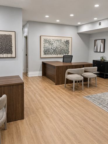 Windsor Leesburg leasing office with charcoal-framed bypass glass doors by Design by DuBois