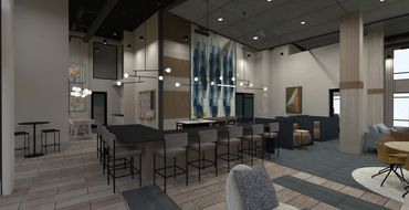 Multifamily renovation feature wall with wallpaper and custom millwork. Games and bar amenity space.