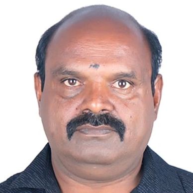 Portrait of a middle-aged man with a mustache.