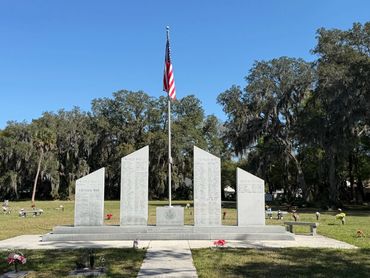 Veterans memorial and American flag at Beaches Memorial Park