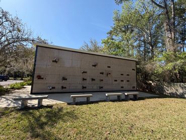 Exterior mausoleum and surrounding trees at Beaches Memorial Park