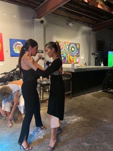 Two beautiful women dancing the tango