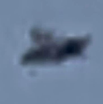 Blurry object in the sky.