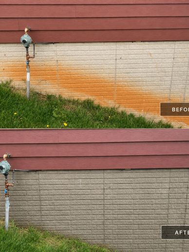 Before and after cleaning a rust-stained wall.