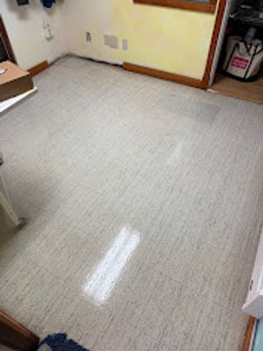 Clean, shiny floor in a room.