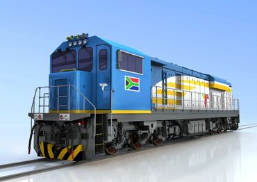Modern blue locomotive with South African flag on tracks.