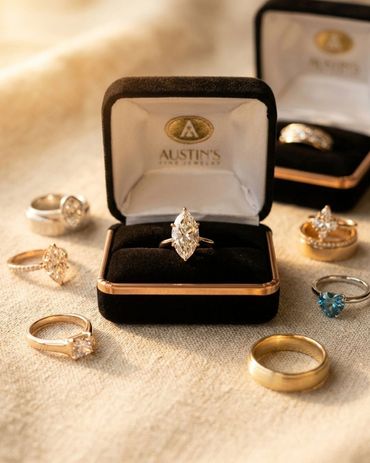 Marquise cut diamond solitaire engagement ring in yellow gold displayed in Austin's Fine Jewelry pre