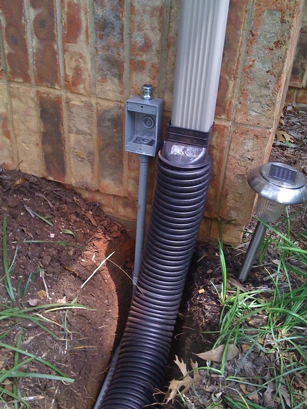 Connect your downspout to a underground drainage pipe extension to protect your home. Coppell,Texas.