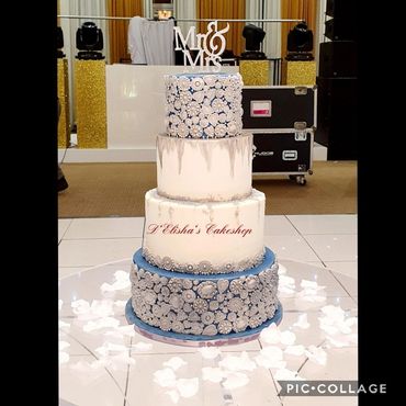 3 tier wedding cake. Mendhi wedding cake in blue theme with mendhi design brooches.