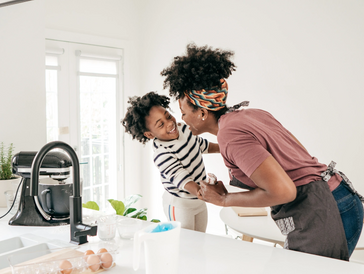 Mother and son are playing with each other