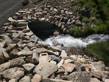 road damage, flooding, road repair, excavation, construction