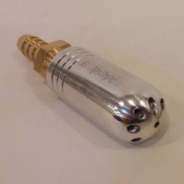 Metal nozzle or valve part with a brass connector.