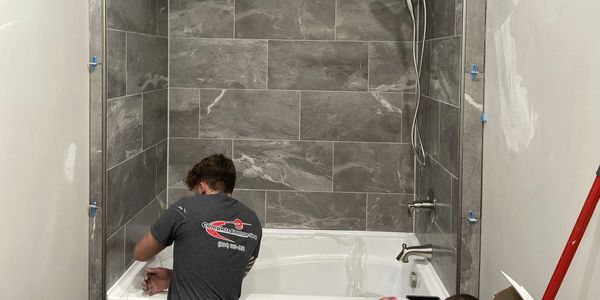Shower tiles being installed