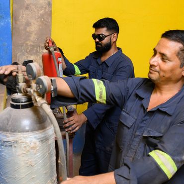 REFILING FIRE EXTINGUISHERS WITH NITROGEN GAS.