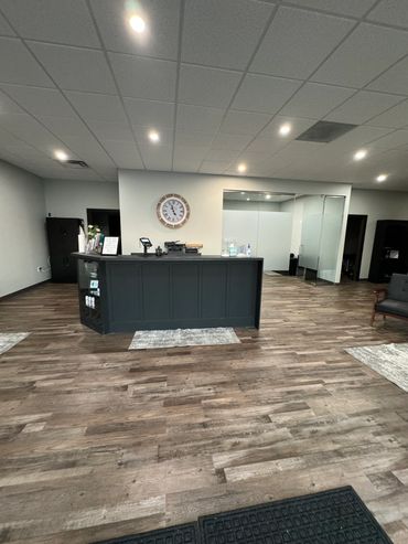 Upon entering our office your will be greeted at our reception desk and Therapy room.