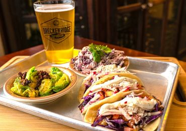 Tacos, Brussels sprouts, slaw, and a pint of beer - Breckenridge Taphouse Restaurant & Bar