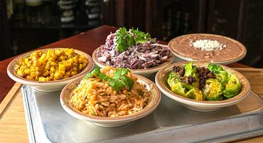 Mexican food rice, beans, corn, cabbage, Brussels sprouts - Breckenridge Taphouse Restaurant & Bar