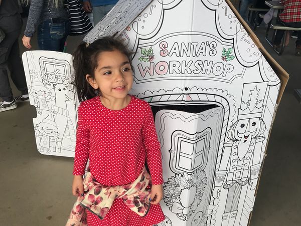 A child enjoy the party and looking on the camera