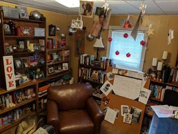 LA Bryce author who writes m/m romance shows some of her books. This is LA Bryce's library.