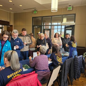 attendees entering Dining Around Greer