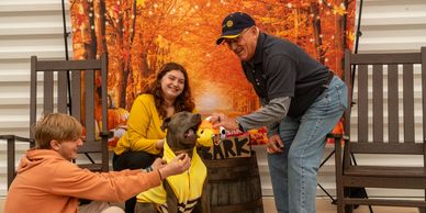 Dog getting his prize for best dressed at Paws & Pints for Polio event
