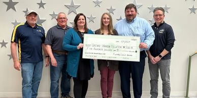 Presentation of check to Upstate Warrior Solution