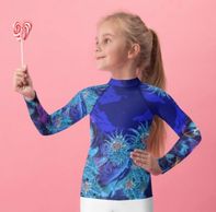 Kid's ocean theme rash guards | little girl wearing coral rash guard | Bubbles & Blues coral theme