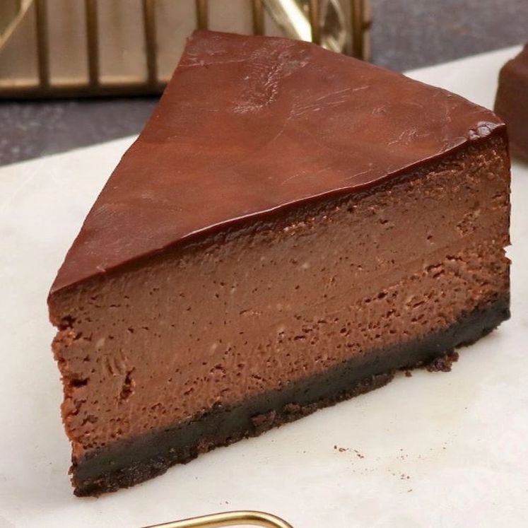 Belgium Chocolate Cheesecake baked with Oreo base that would elevate your senses.