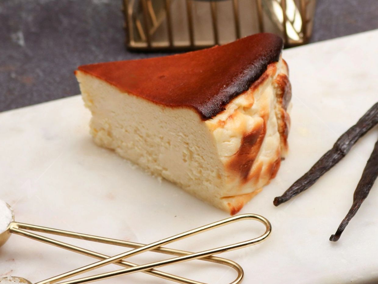 San Sebastian Spanish burnt basque cheesecake is perfectly baked to delicately balance the caramelis