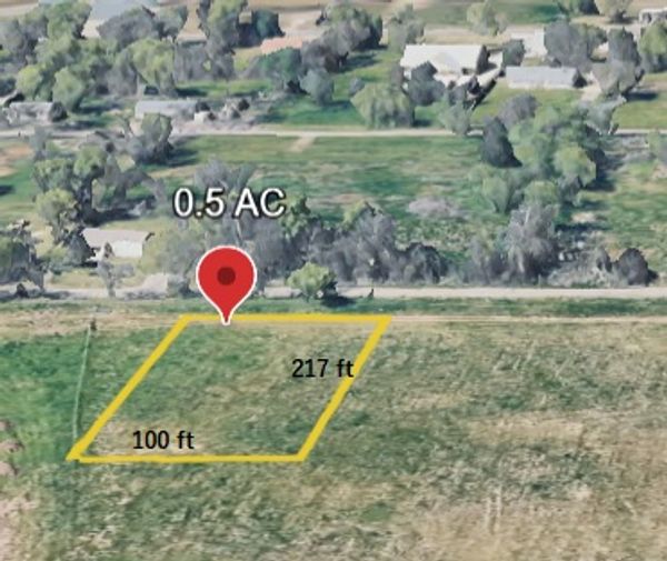 A 0.5-acre plot of land measuring 100 by 217 feet outlined in yellow.
